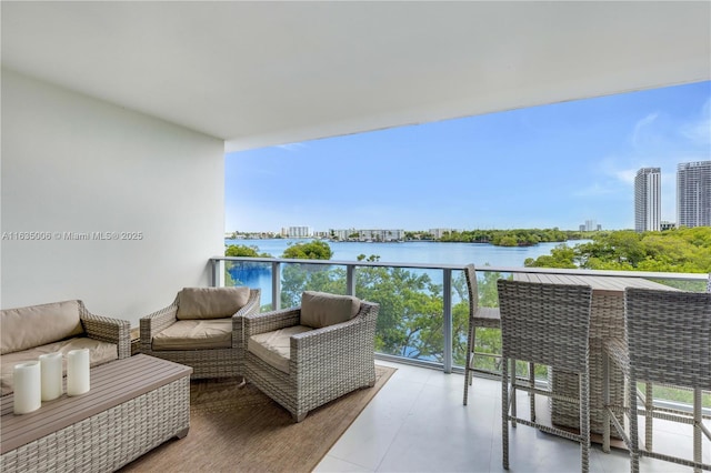 balcony featuring a water view