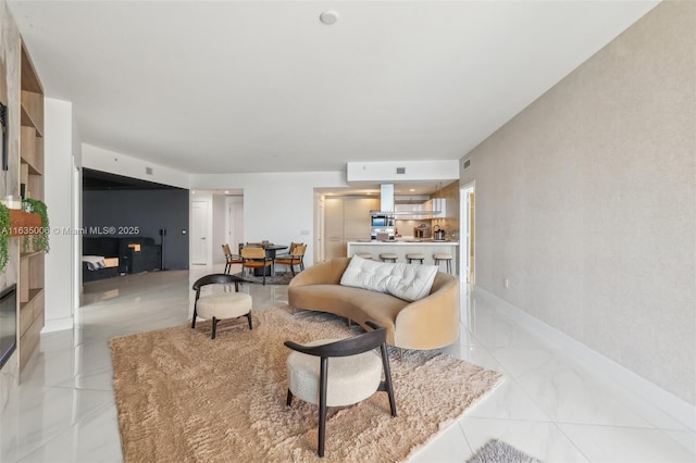 17111 Biscayne Blvd Unit 304, North Miami Beach, FL 33160 - living area featuring light marble finish flooring