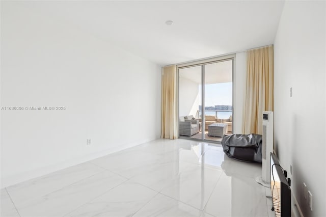 17111 Biscayne Blvd Unit 304, North Miami Beach, FL 33160 - unfurnished room featuring floor to ceiling windows