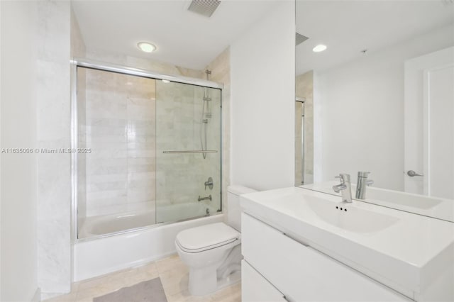 17111 Biscayne Blvd Unit 304, North Miami Beach, FL 33160 - bathroom with vanity, shower / bath combination with glass door, tile patterned floors, and recessed lighting