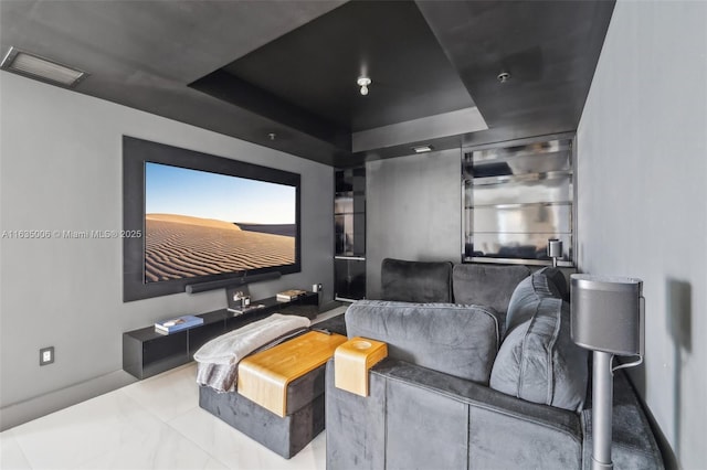17111 Biscayne Blvd Unit 304, North Miami Beach, FL 33160 - home theater featuring a raised ceiling and baseboards