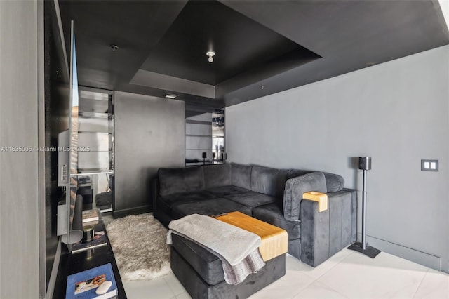 17111 Biscayne Blvd Unit 304, North Miami Beach, FL 33160 - tiled living area with a raised ceiling
