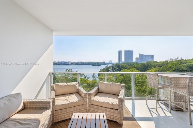17111 Biscayne Blvd Unit 304, North Miami Beach, FL 33160 - balcony featuring a water view, a view of city, and an outdoor living space