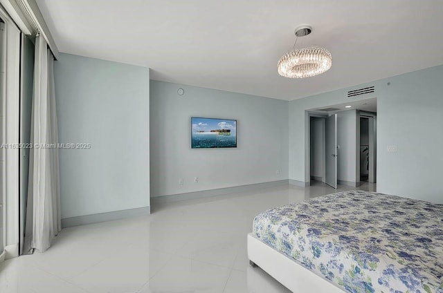 bedroom with light tile patterned flooring, a notable chandelier, baseboards, and visible vents