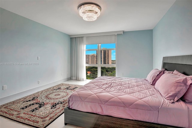 bedroom with a chandelier