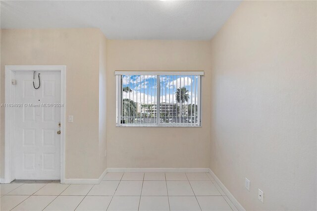 interior space featuring light tile patterned flooring