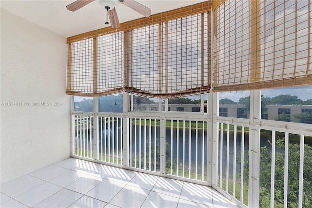 exterior space with ceiling fan