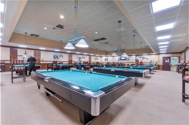 game room featuring pool table, a drop ceiling, and light colored carpet