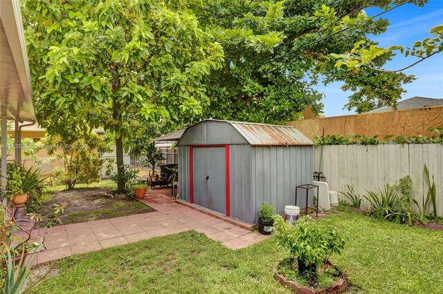 view of outbuilding featuring a yard