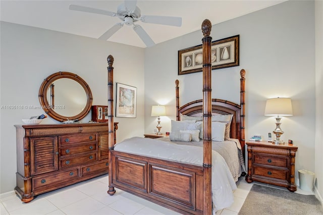 tiled bedroom with ceiling fan