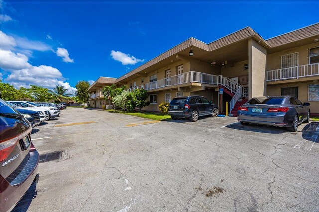 view of parking / parking lot