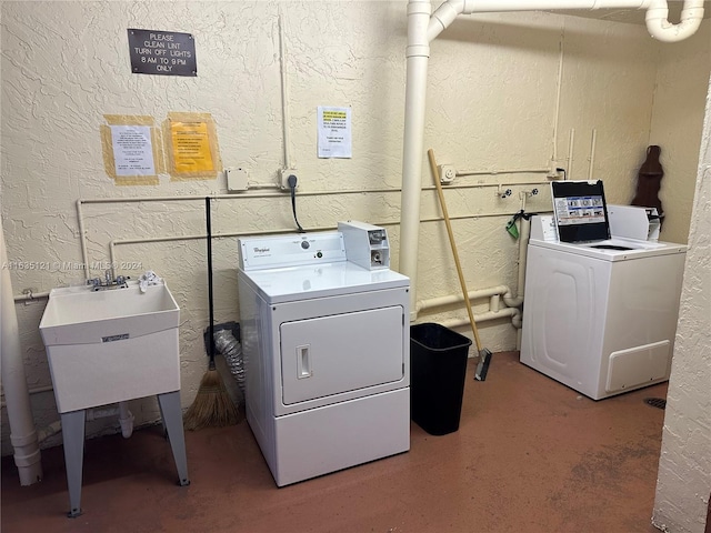 laundry room featuring separate washer and dryer