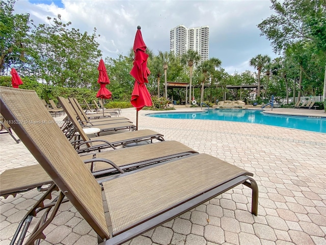 community pool featuring a patio