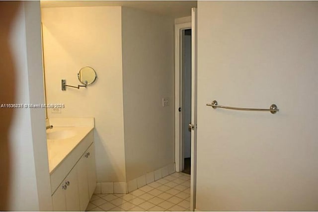 bathroom featuring tile patterned floors and vanity