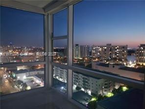 view of balcony at dusk