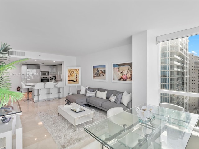 living room featuring tile patterned floors