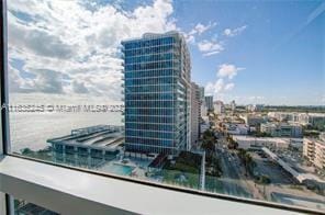 exterior space featuring central AC and a view of city