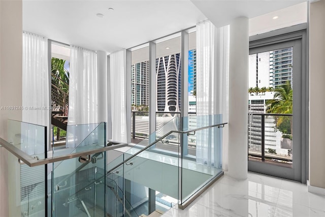 interior space featuring floor to ceiling windows and plenty of natural light