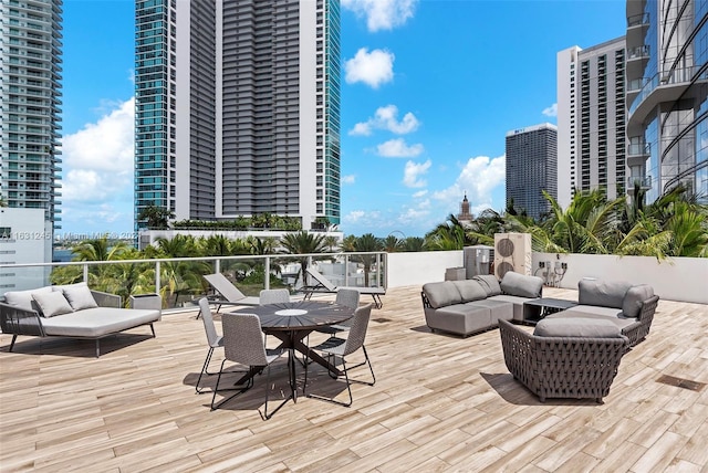 wooden deck with outdoor lounge area