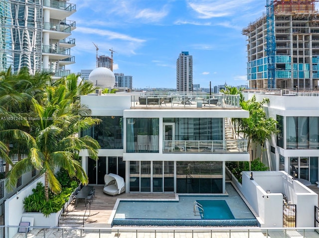 rear view of property with a patio area