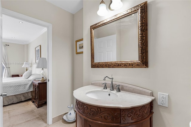 bathroom with vanity, tile patterned flooring, and crown molding