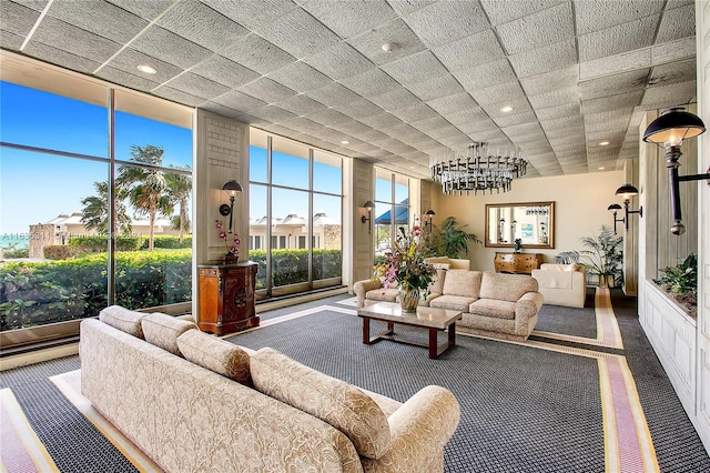 sunroom with a notable chandelier