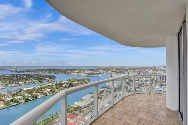 balcony featuring a water view