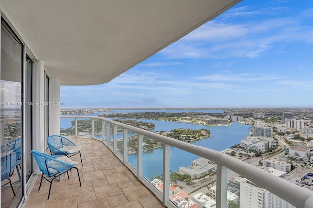 balcony featuring a water view