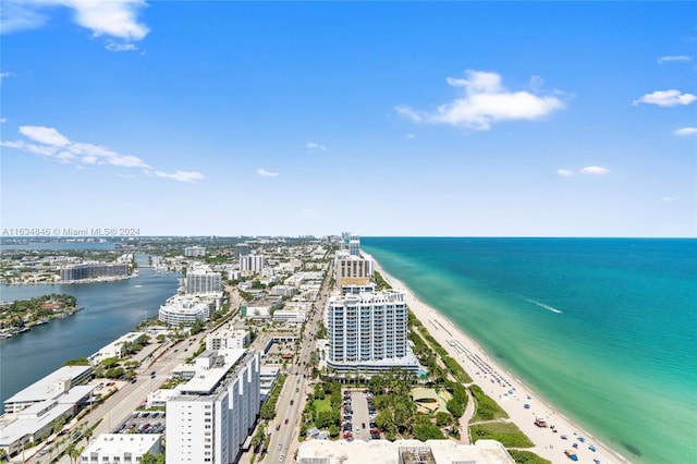 aerial view featuring a beach view and a water view