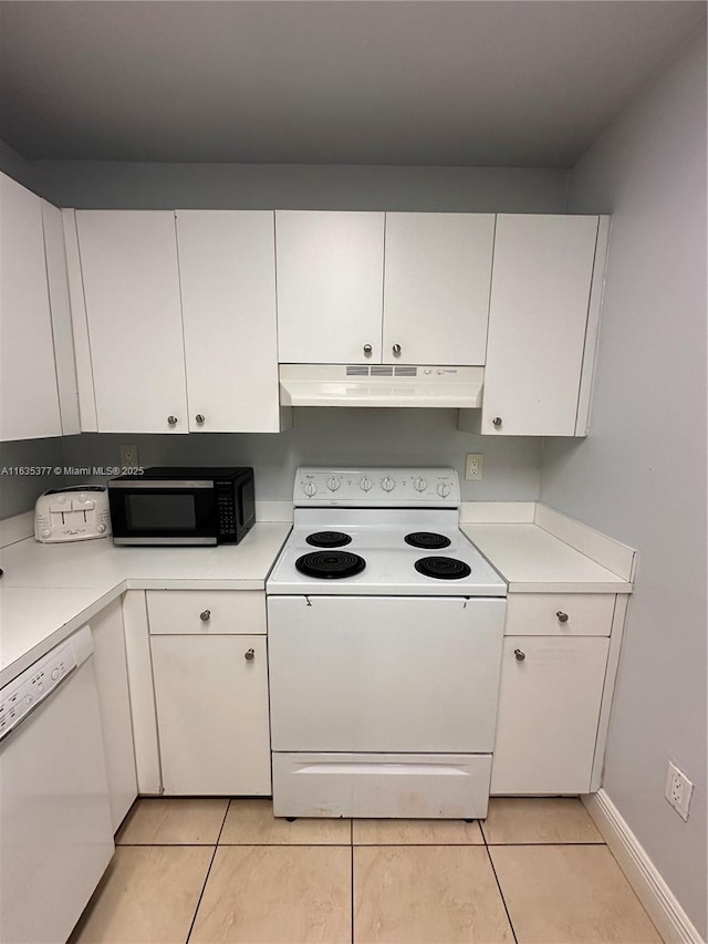 kitchen featuring light countertops, white appliances, white cabinetry, and under cabinet range hood