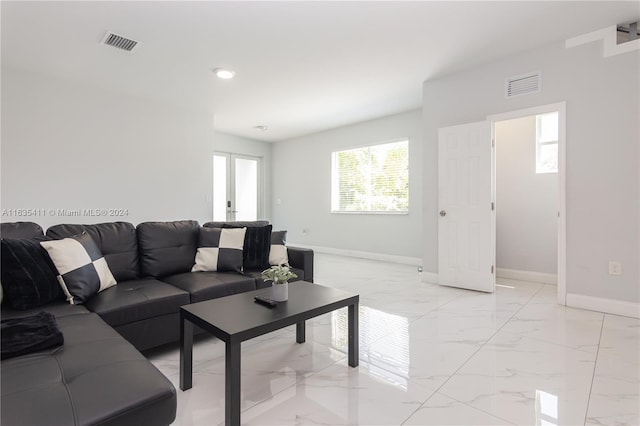 living room featuring light tile patterned floors