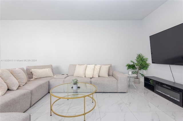 living room with marble finish floor