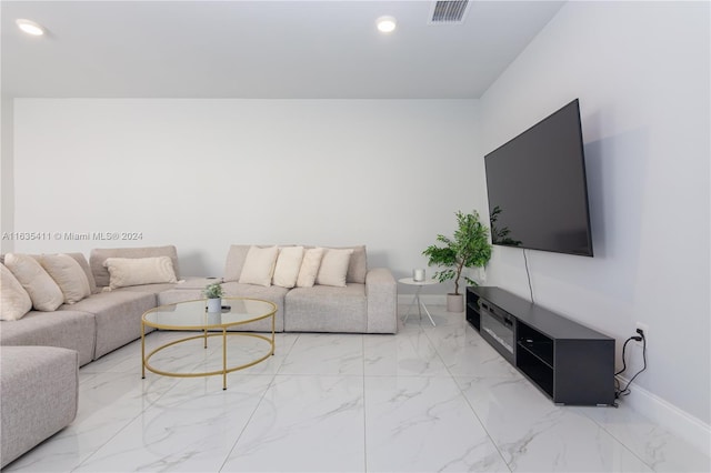 living room featuring recessed lighting, visible vents, marble finish floor, and baseboards