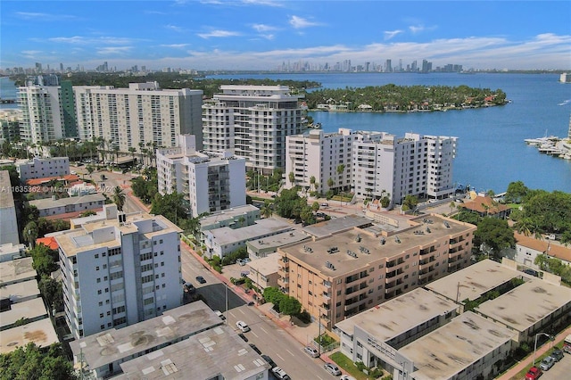 drone / aerial view with a water view and a city view