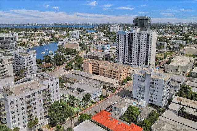 bird's eye view with a city view and a water view