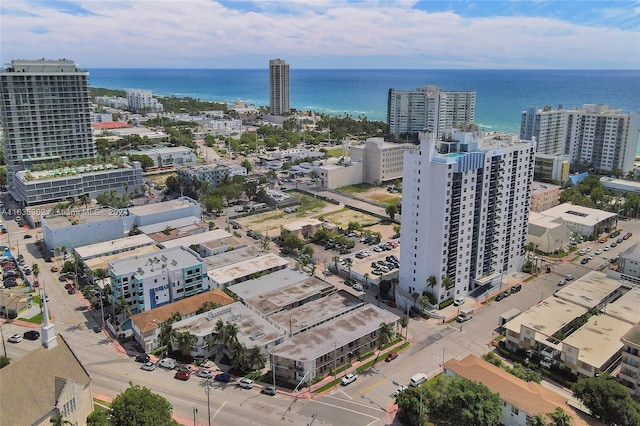 aerial view with a water view and a city view