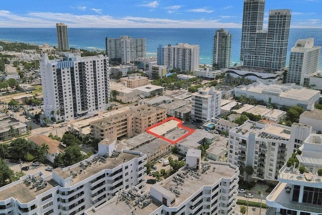 drone / aerial view with a water view and a view of city