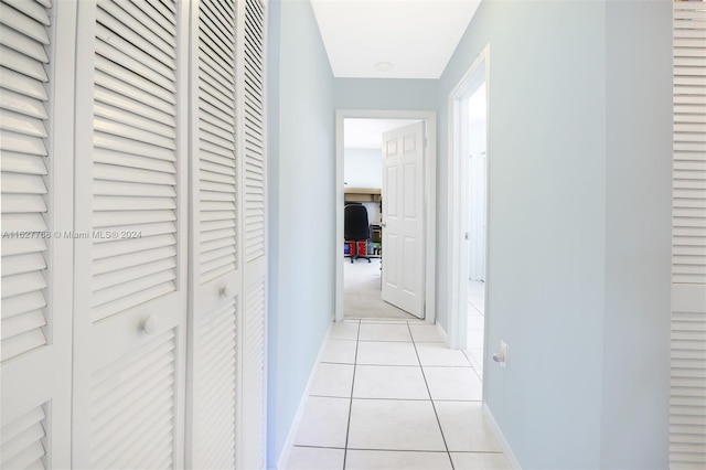 hallway featuring light tile patterned flooring