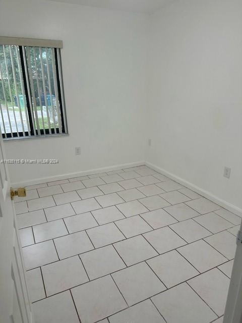 view of tiled empty room