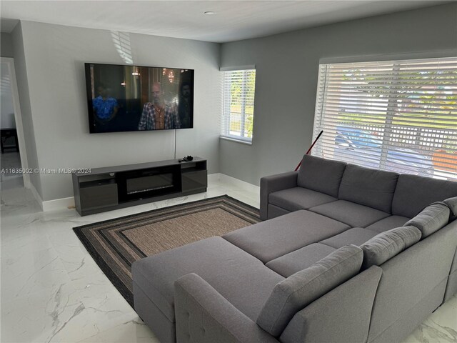 living room featuring tile patterned flooring