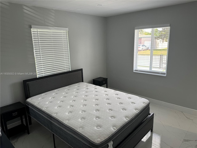 bedroom with tile patterned flooring