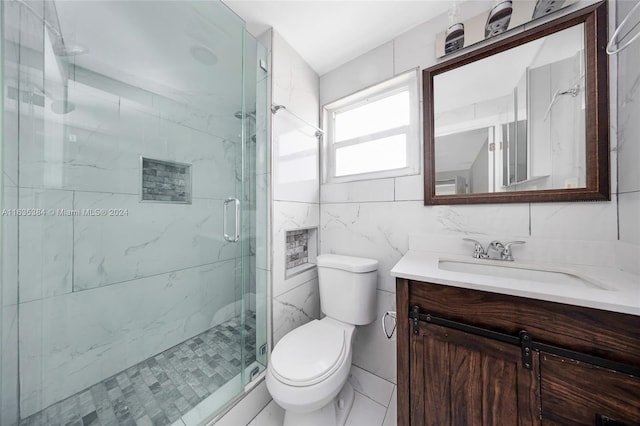 bathroom featuring vanity, walk in shower, tile walls, toilet, and decorative backsplash