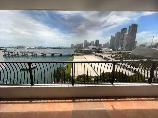 balcony featuring a water view