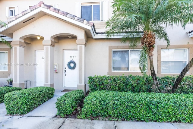 2203 SE 23rd Ter Unit 2203, Homestead, FL 33035 - view of exterior entry with stucco siding