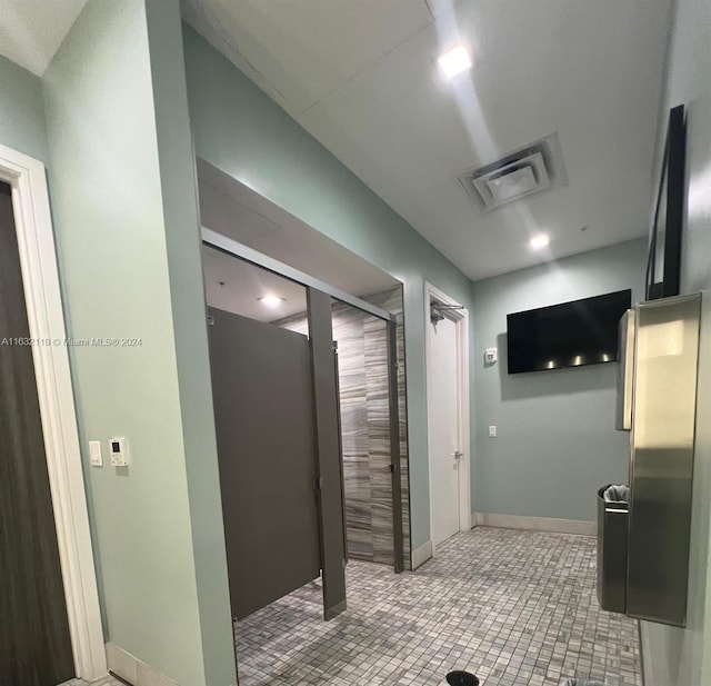 bathroom featuring tile patterned flooring