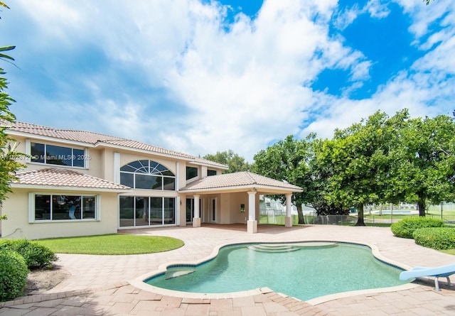 view of pool featuring a patio