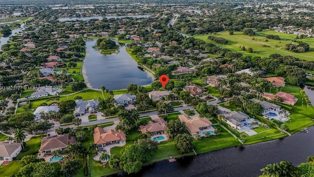 birds eye view of property featuring a water view