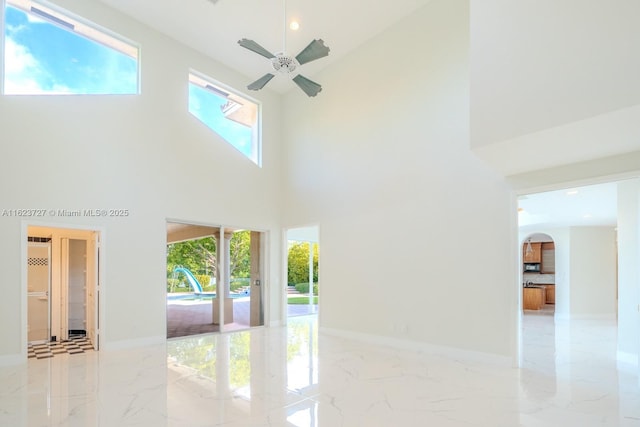 interior space with a towering ceiling