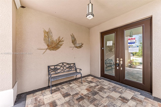 doorway to property with french doors