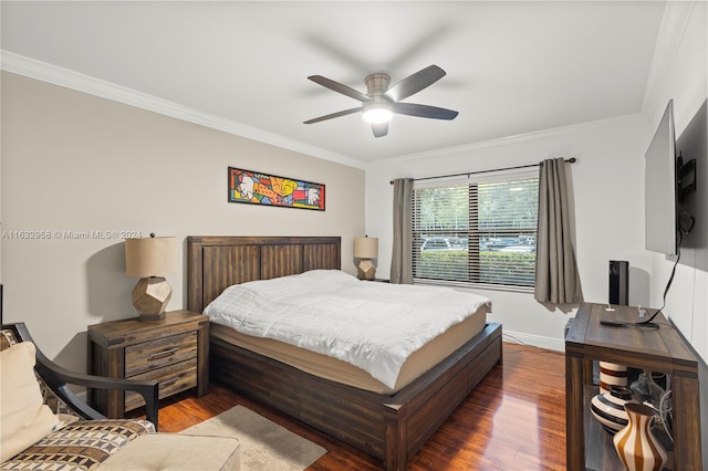 bedroom featuring ceiling fan, hardwood / wood-style floors, and crown molding